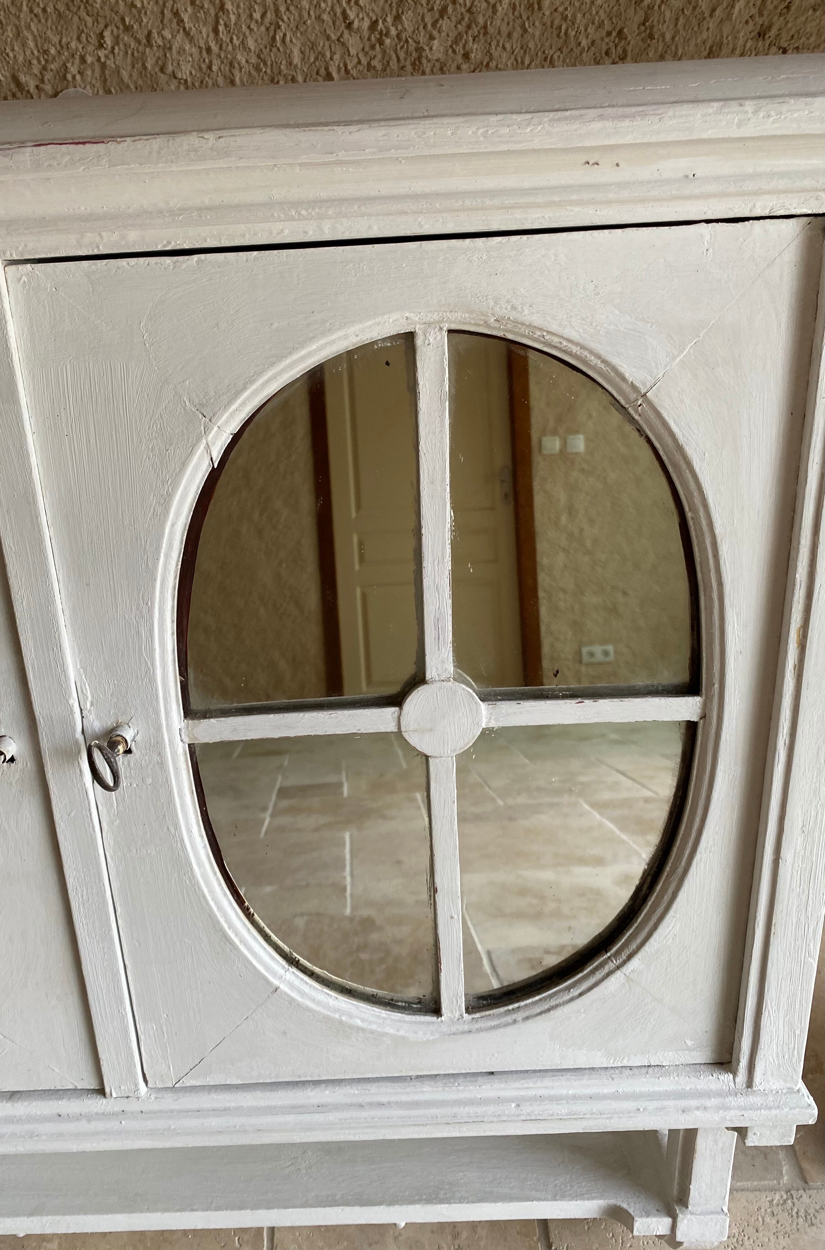 Old storage unit with mirror