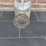 Zinc watering can with its apple
