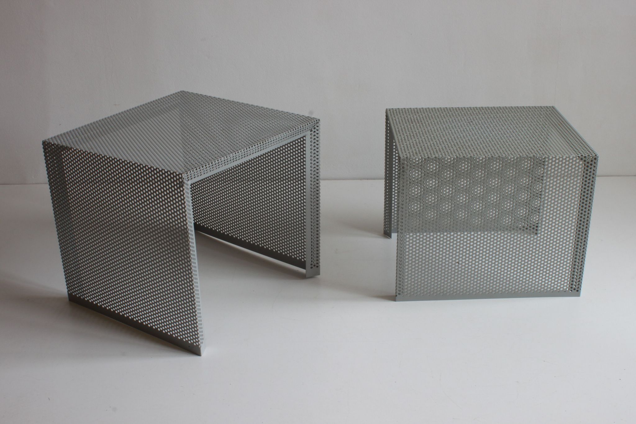 Grey perforated metal nesting side tables, 1990s set of two.