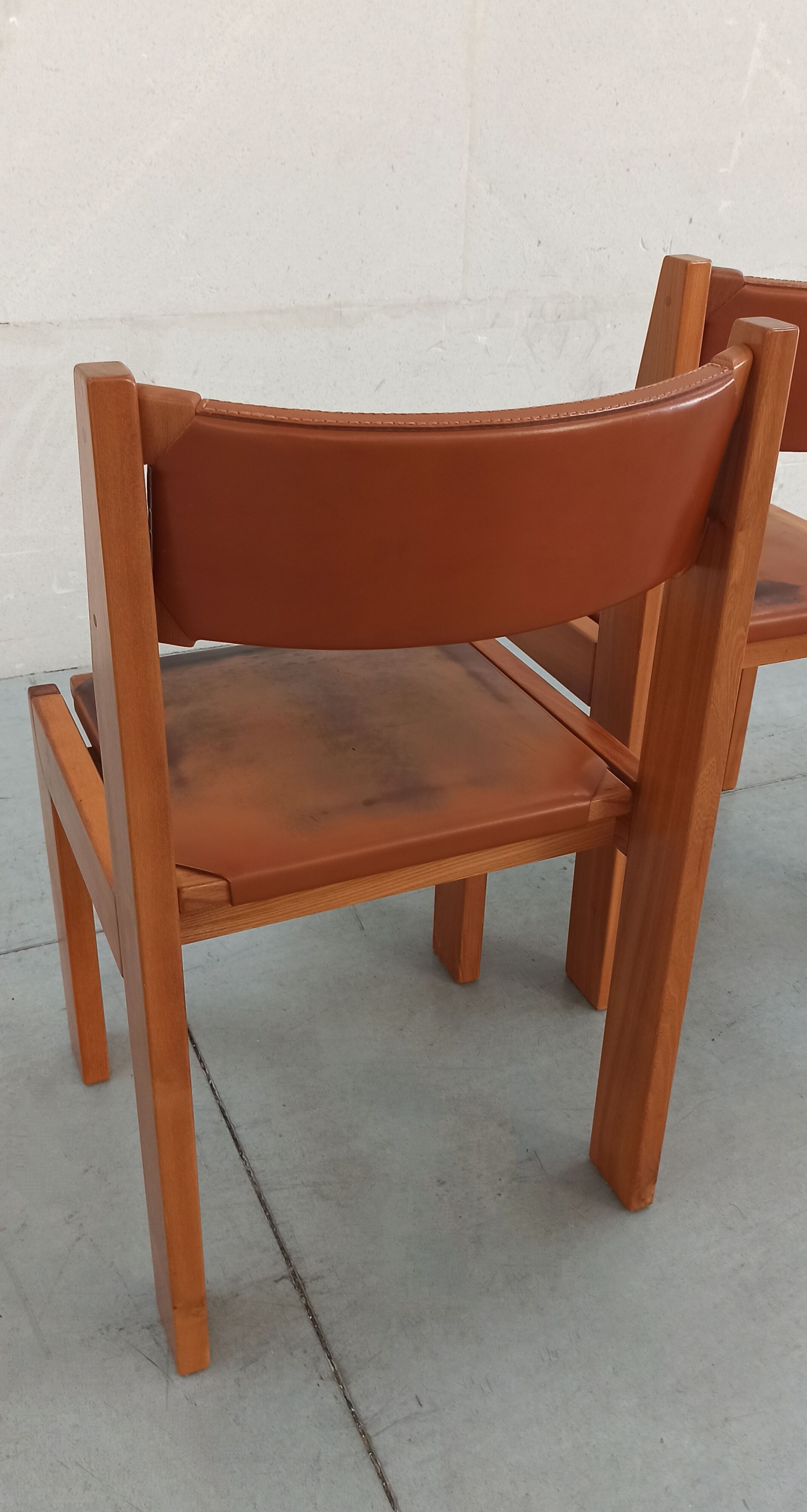 Elm and leather chairs, 80