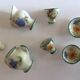 Small antique tea set in porcelain for children.