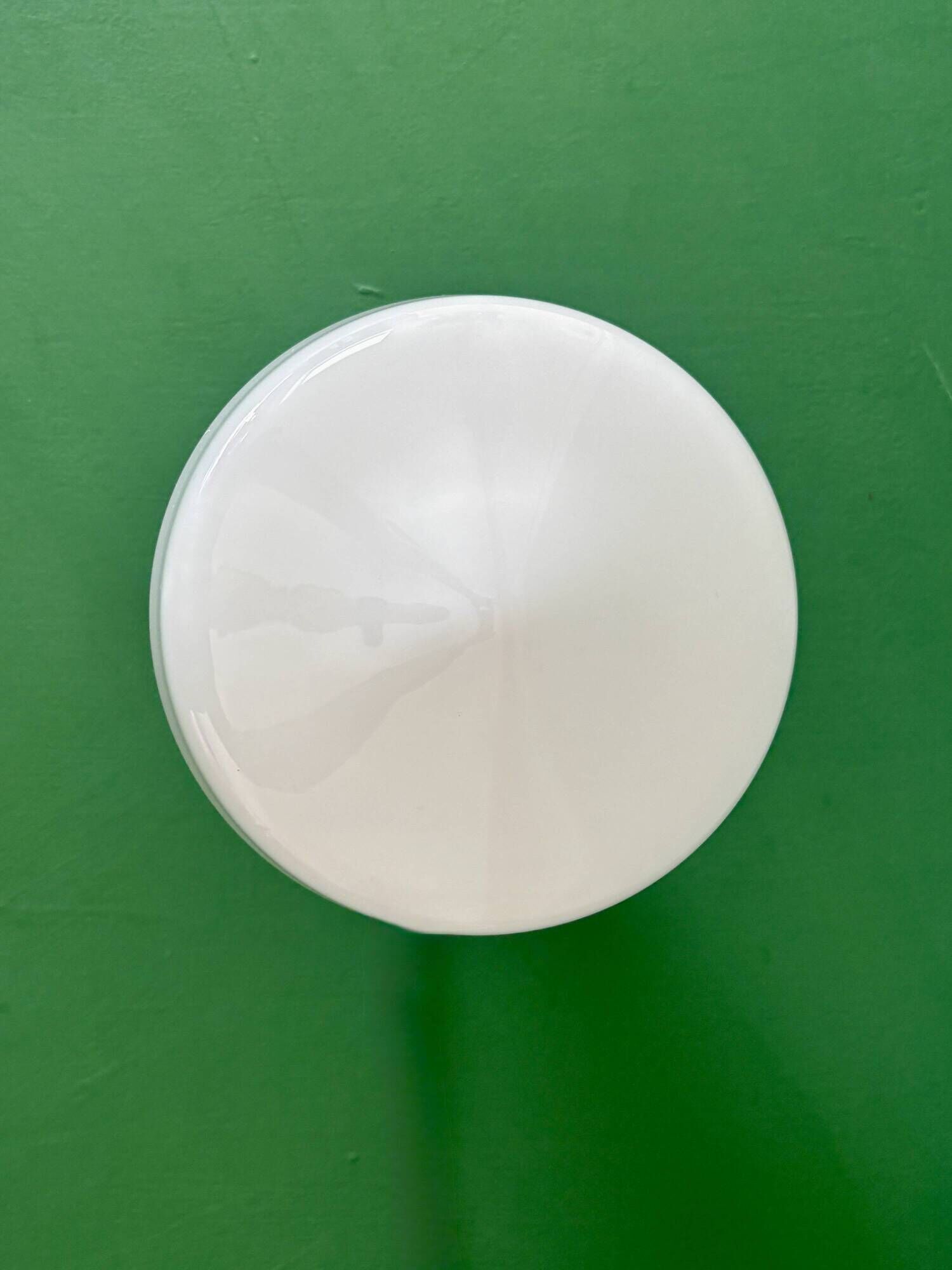Vintage Art Deco globe wall light in white opaline.