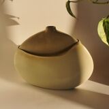 Ceramic with flattened body