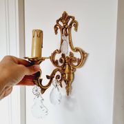 2 antique bronze and rock crystal candles and one light sconces in classic style