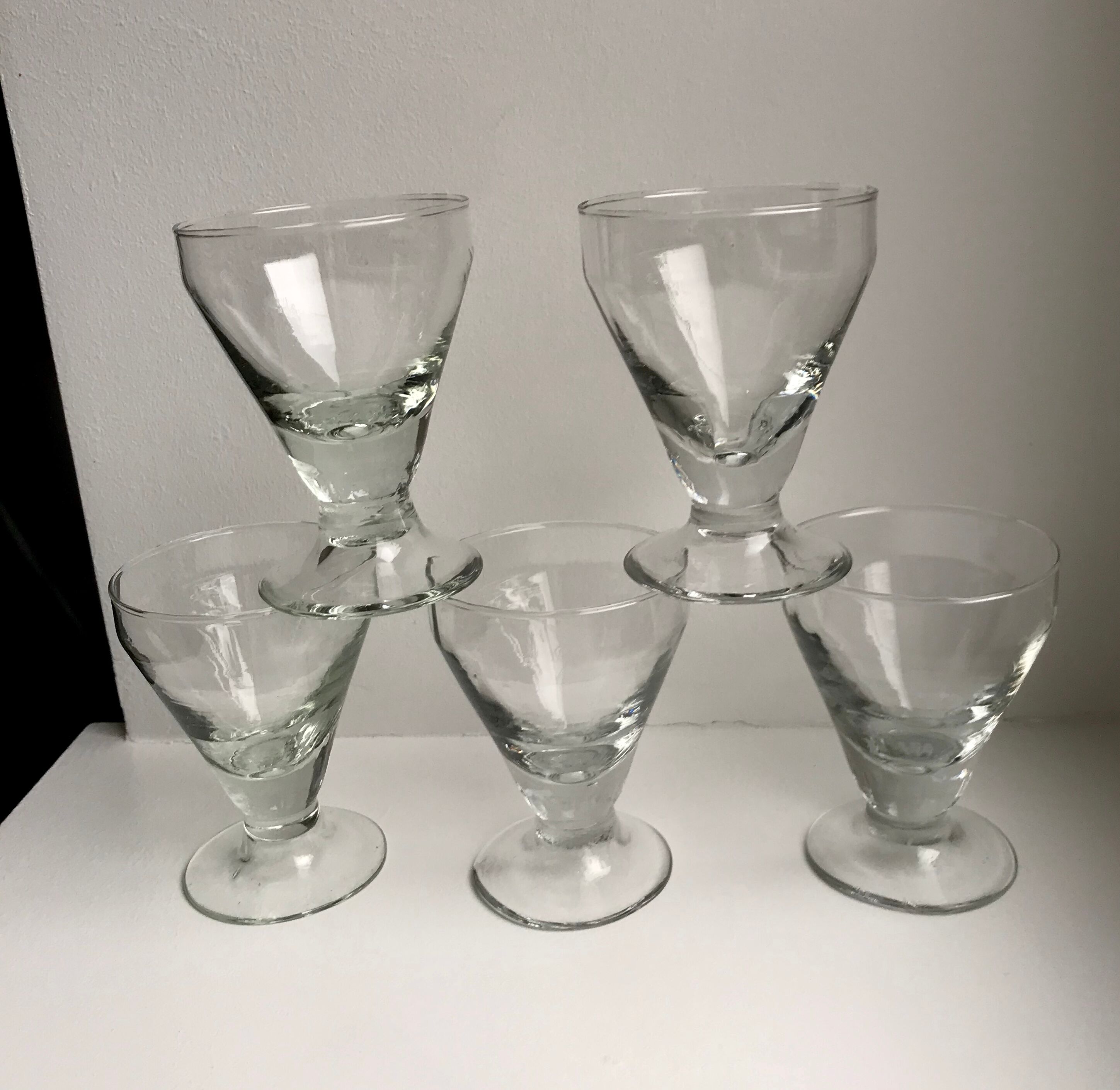 set of 5 glasses with thick bottom feet early twentieth century