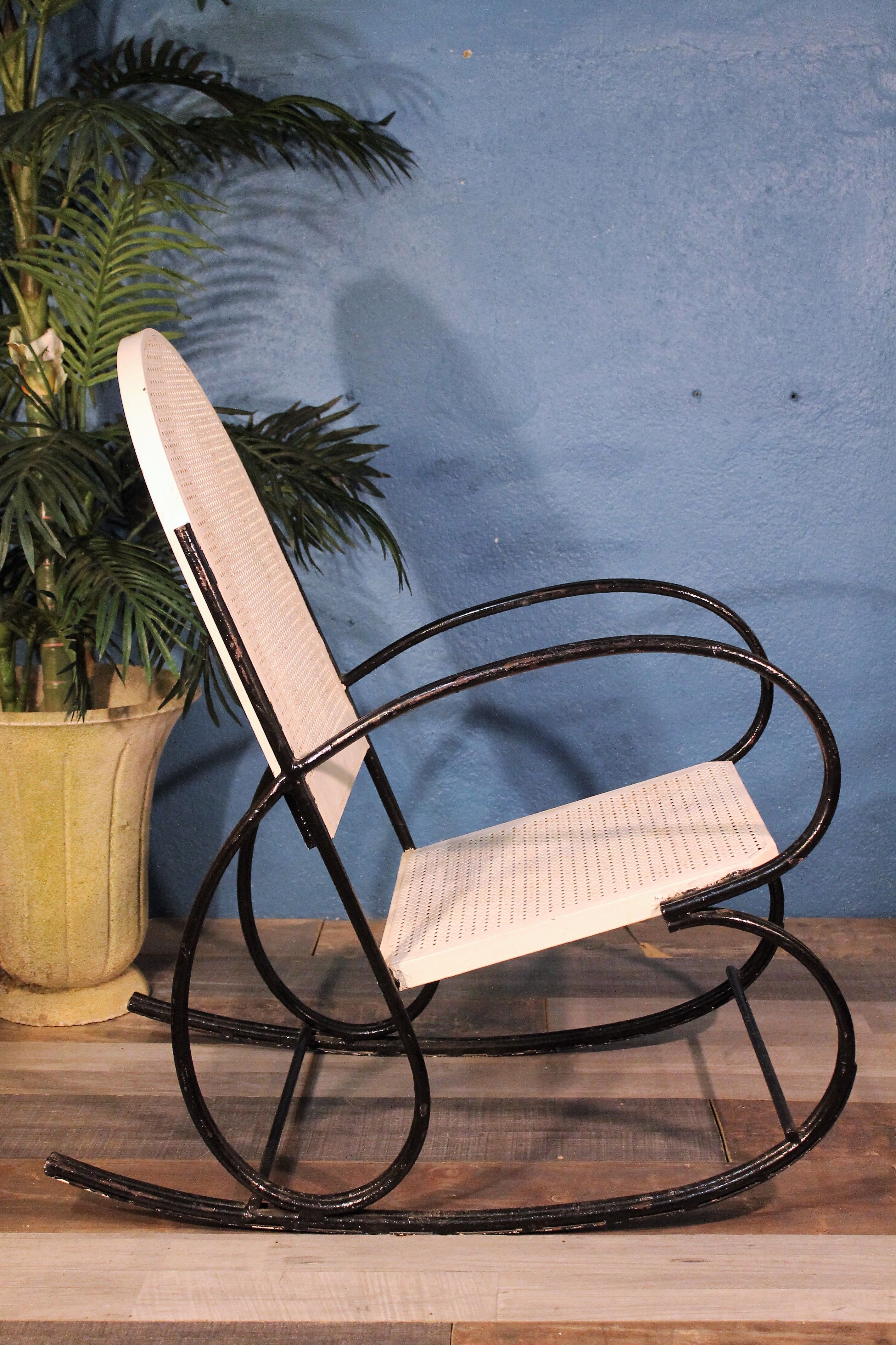 1950s perforated metal rocking chair