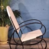 1950s perforated metal rocking chair