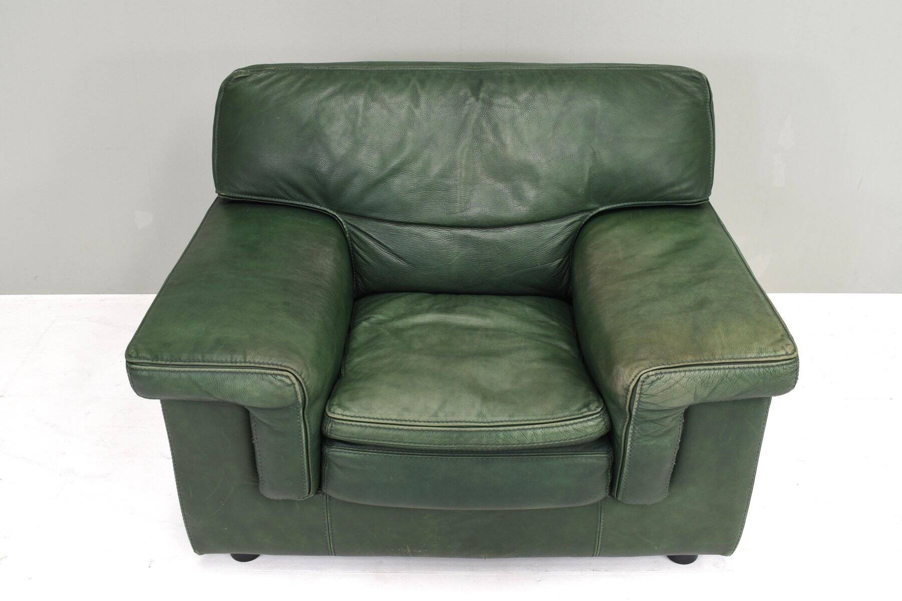 Roche Bobois lounge armchair in original green patinated leather, 1970