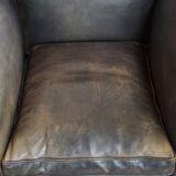 Sheepskin design armchair in a beautiful deep dark color