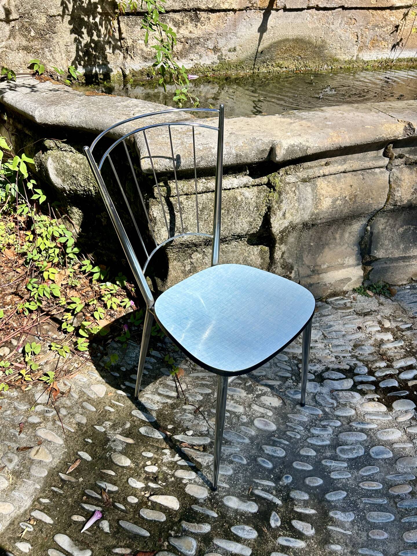 Chrome chair with blue Formica