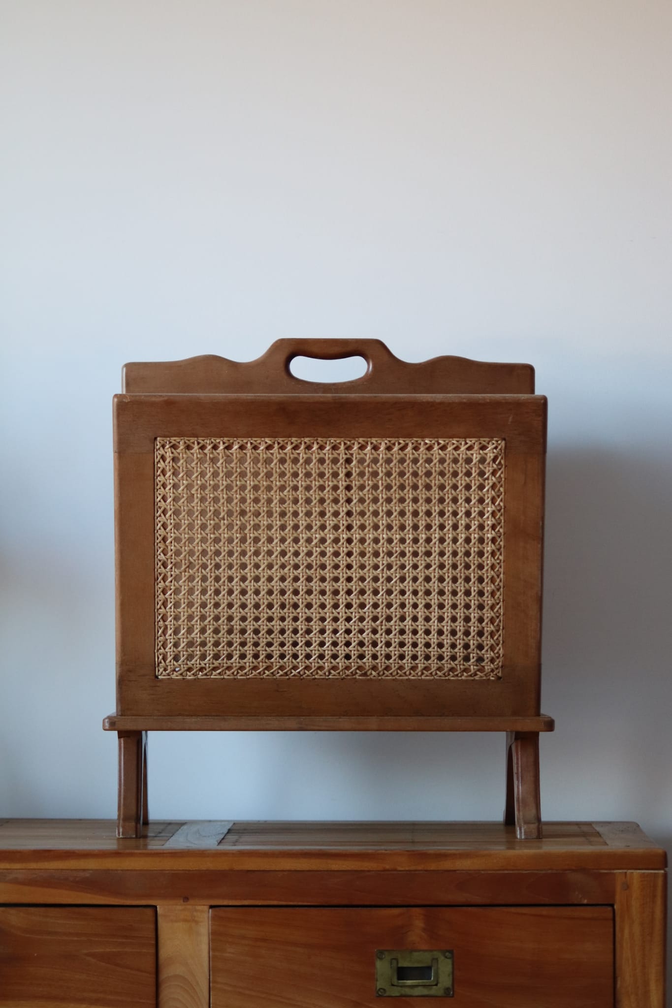 Wooden magazine holder and vintage cannage