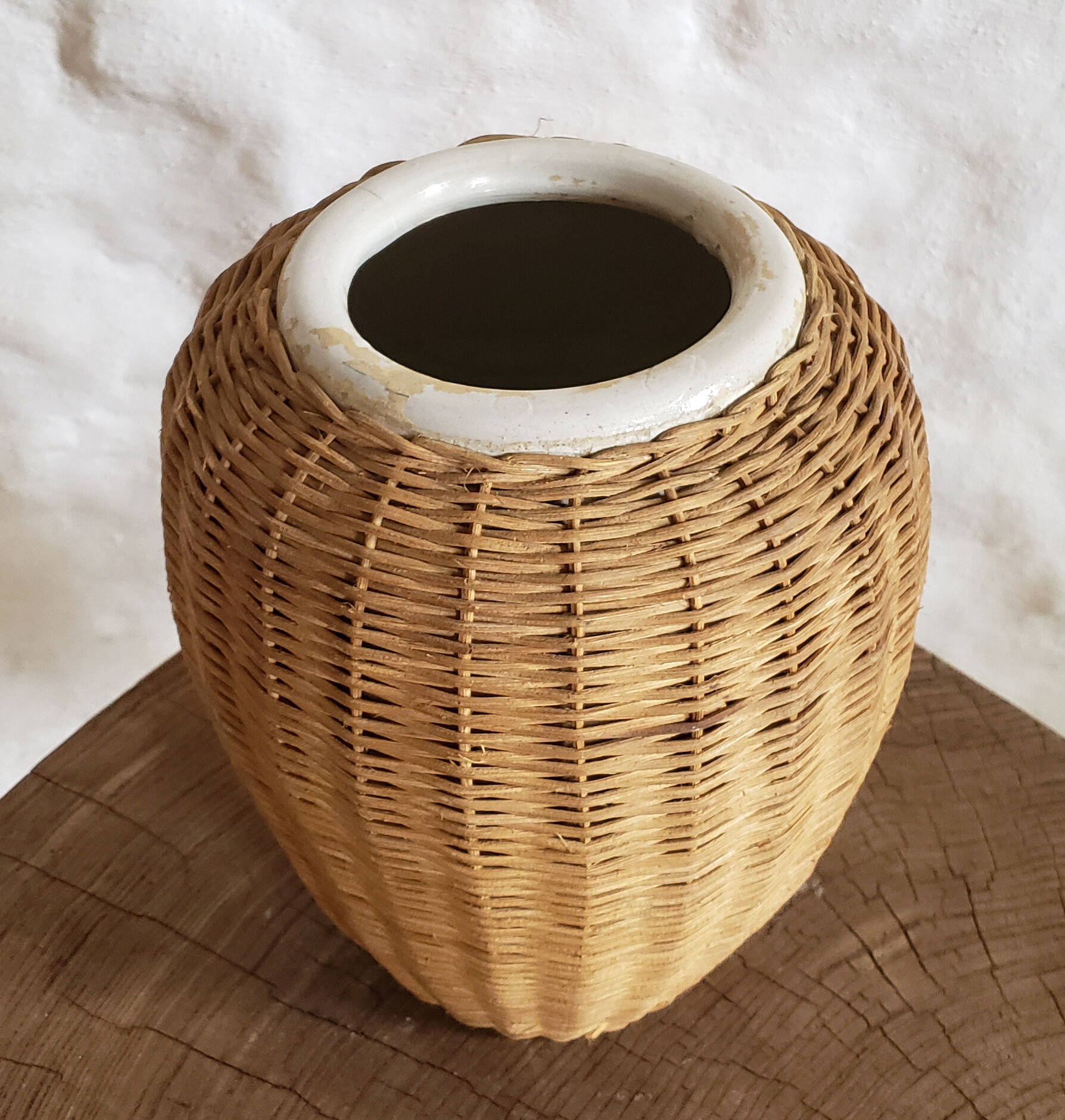 Sandstone and rattan vase