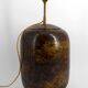 Art Deco modernist lamp in patinated brass, circa 1930.