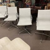 Suite of 4 armchairs in white Ray and Charles Eames leather