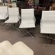Suite de 4 fauteuils en cuir blanc Ray et Charles Eames