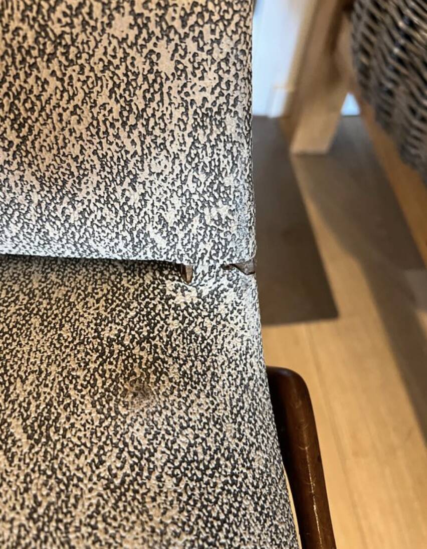 (Lot) 2 teak designer chairs (1950s)