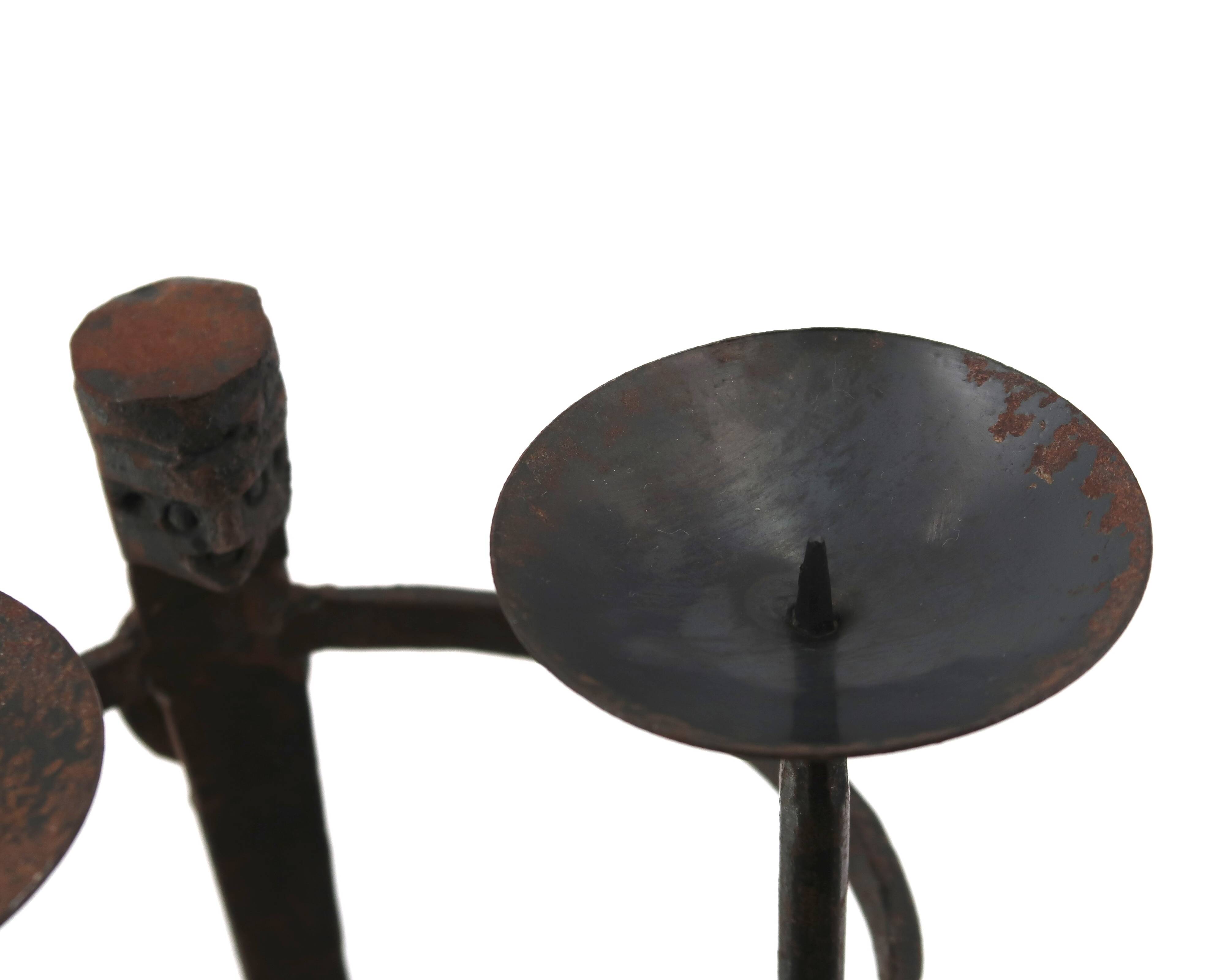Anthropomorphic wall candle holder in wrought iron, 1950s.