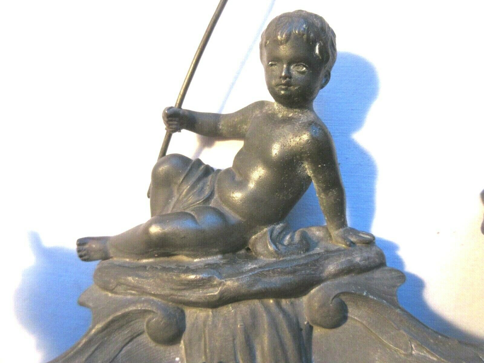 Double ink out 19th in tin signed J. GARNIER: The Cherub fisherman