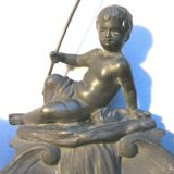 Double ink out 19th in tin signed J. GARNIER: The Cherub fisherman