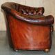 Curved Chesterfield canapé in hand-dyed vintage leather, fully restored.