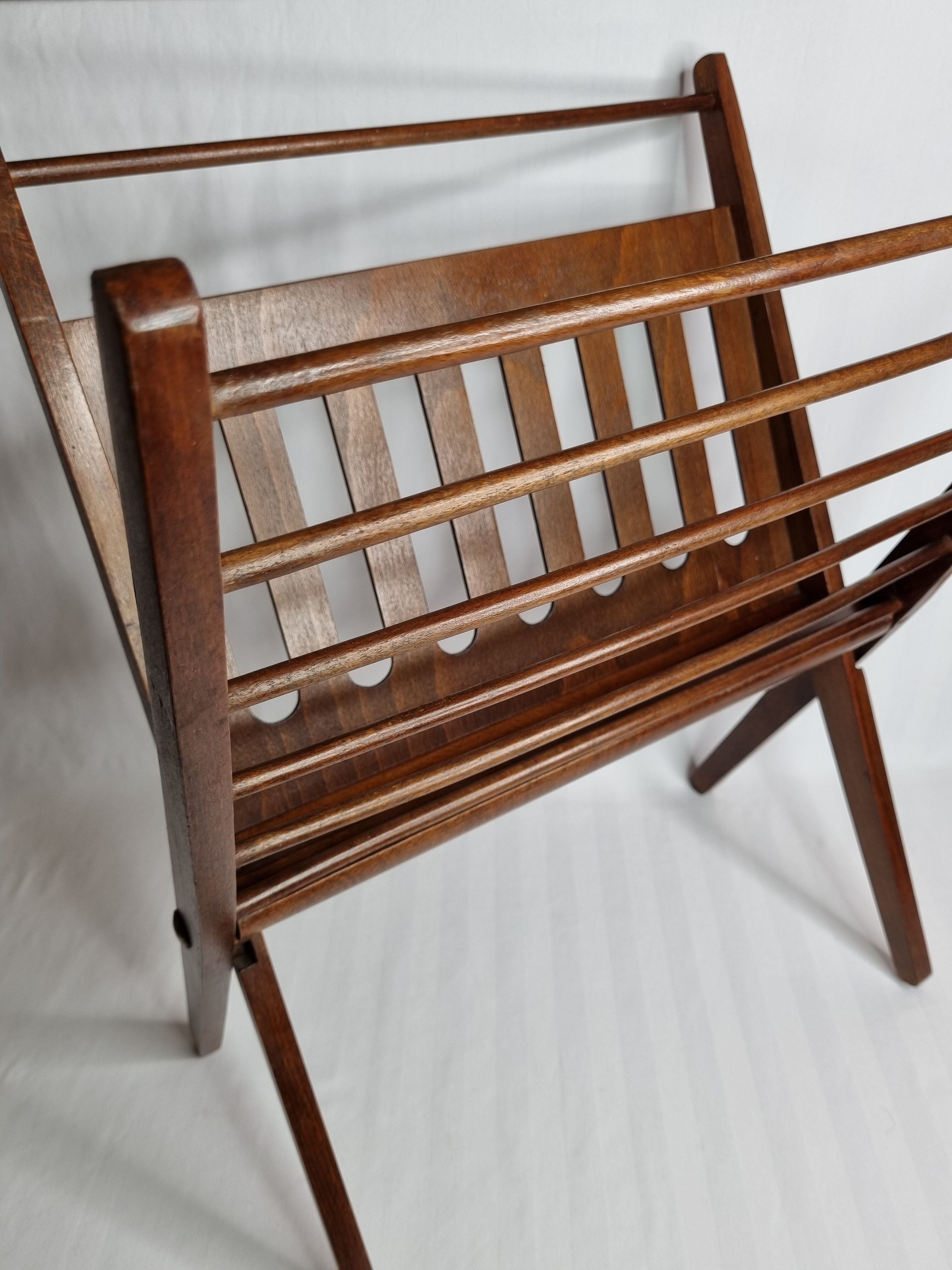 Folding teak magazine door by Cees Braakman