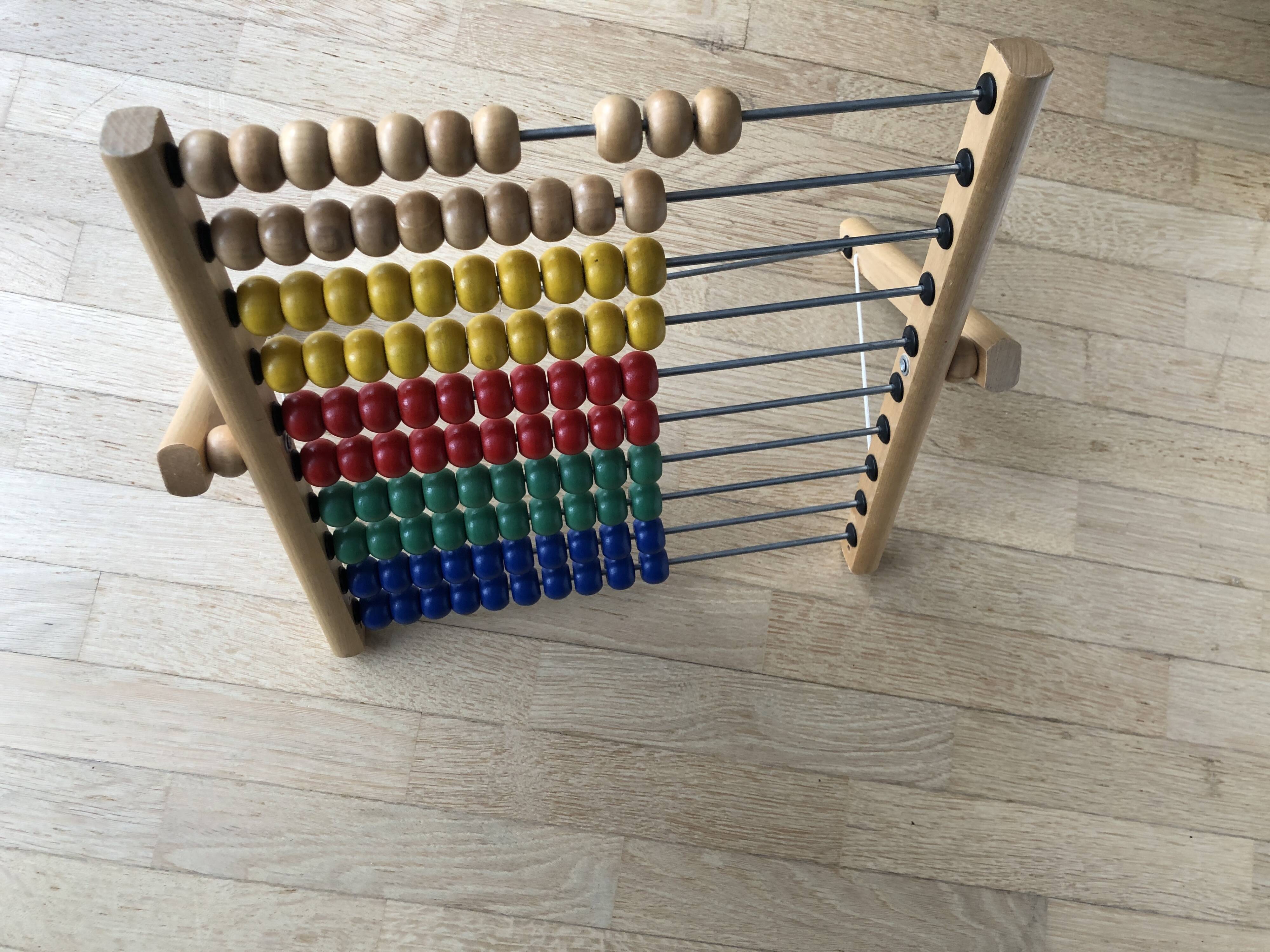 Vintage abacus in wood and primary colors