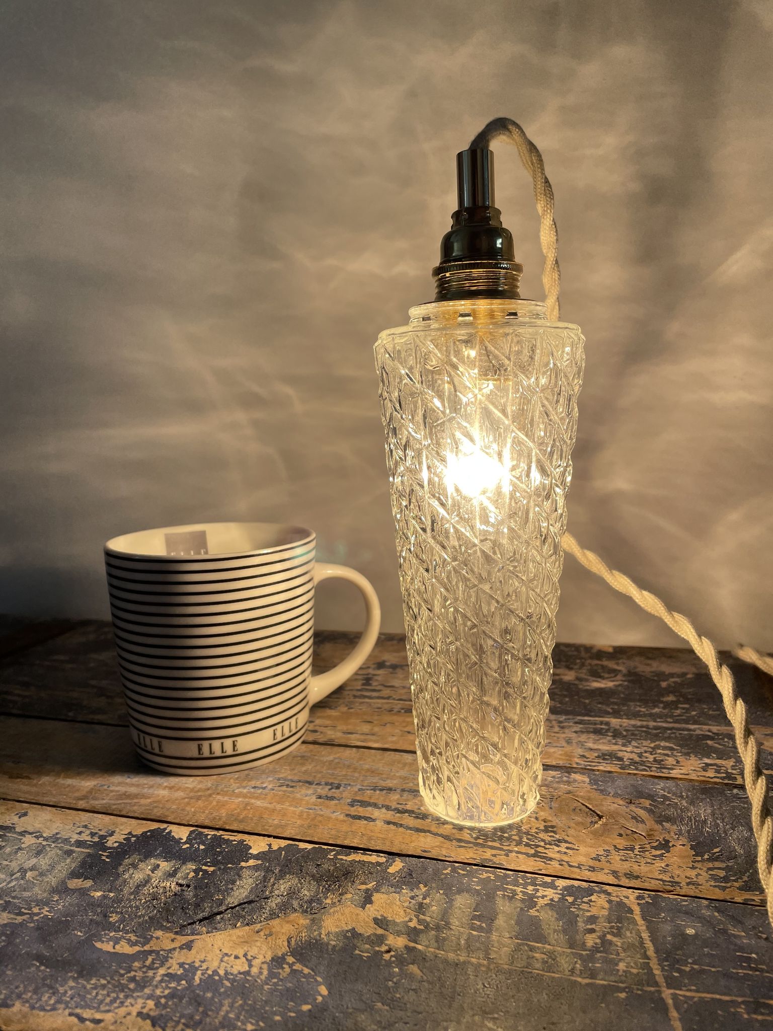 Set of two vintage electric chiseled glass walking lamps