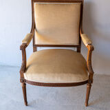Antique armchair in solid wood