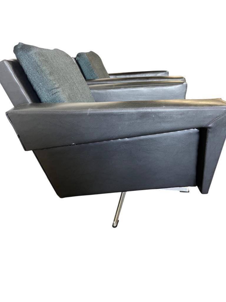 Ensemble de 2 fauteuils vintage monoplace sur piètements étoiles chromés