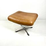 Brown leather ottoman on chrome base