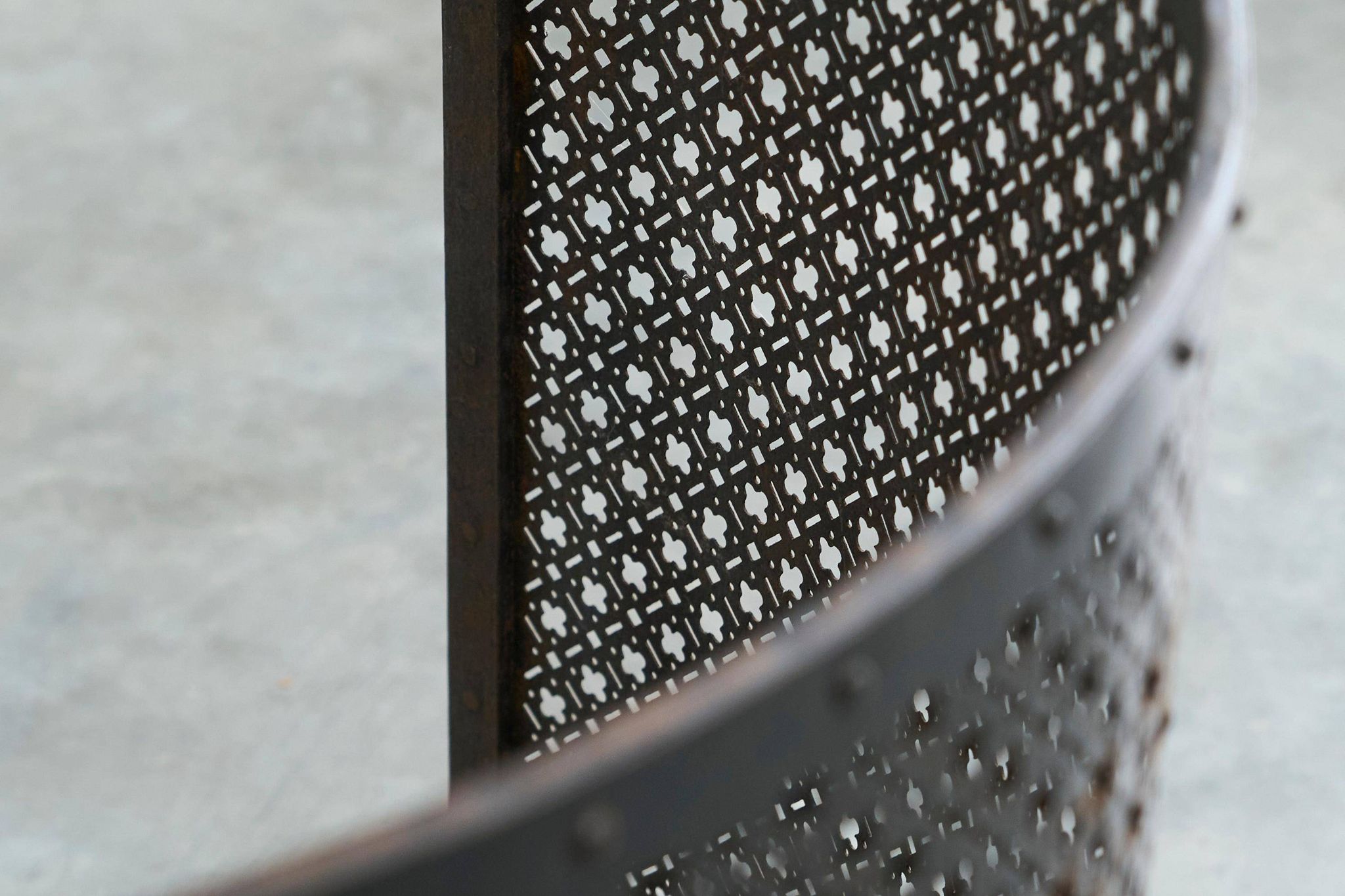 Half-moon antique wrought iron fire screen from the 19th century.