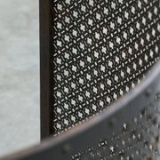 Half-moon antique wrought iron fire screen from the 19th century.
