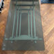 70s design coffee table in rectangular glass with chrome legs.