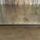 Riveted metal industrial coffee table, Jansen style