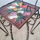 Small chair / stool in twisted wrought iron and floral ceramic.