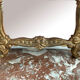 Antique mirror in stuccoed and gilded wood - rocaille style - France 50x86cm