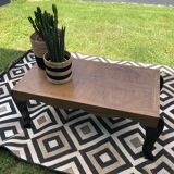 Table basse noire et bois