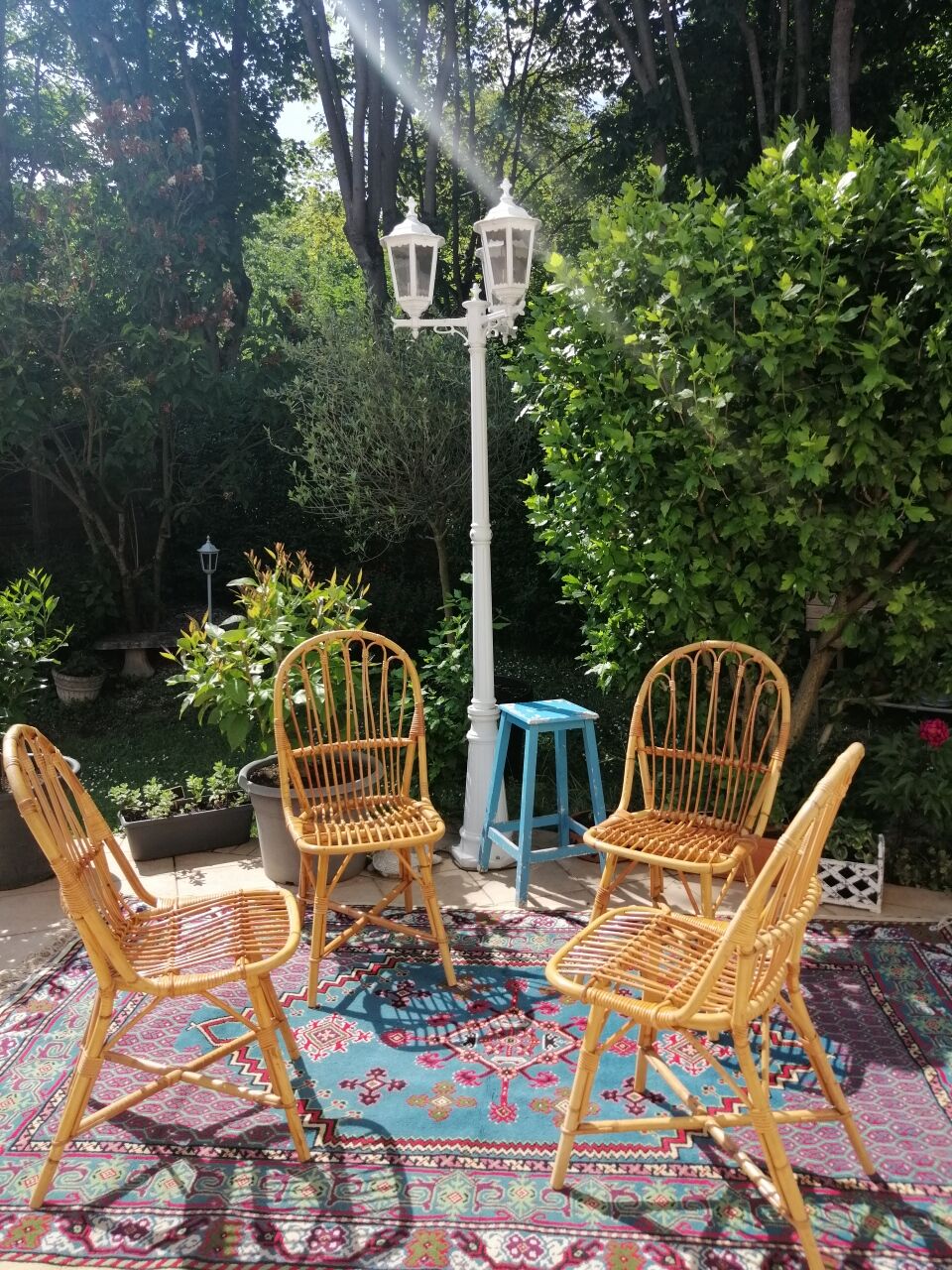 Series of 4 vintage rattan chairs.