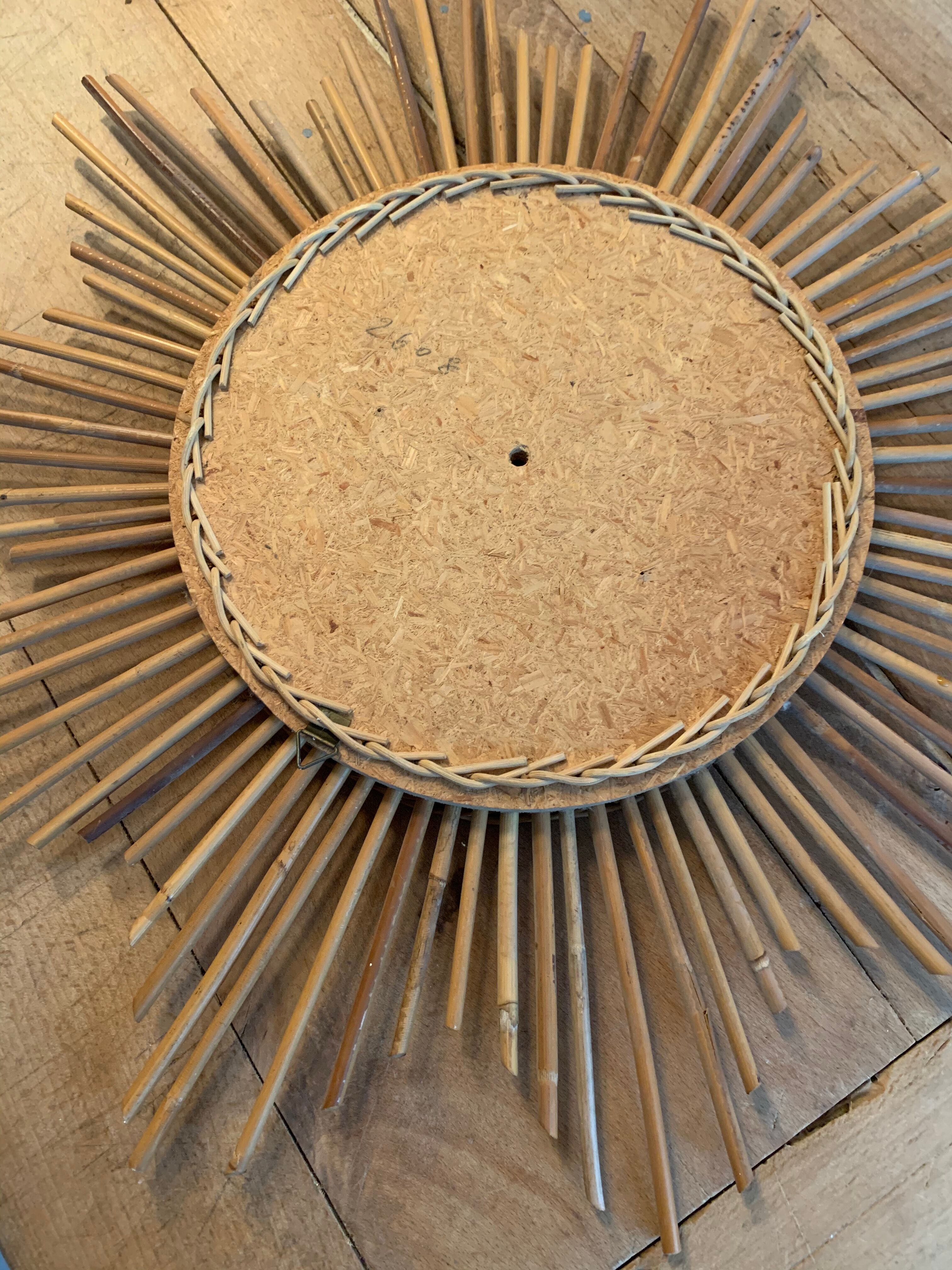 Vintage rattan sun mirror