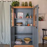 Old glass-fronted wooden library – blue interior