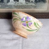 Old bowl in earthenware with floral decoration.