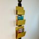 Valenti brass & leather wall-mounted magazine rack, Spain, 1970s