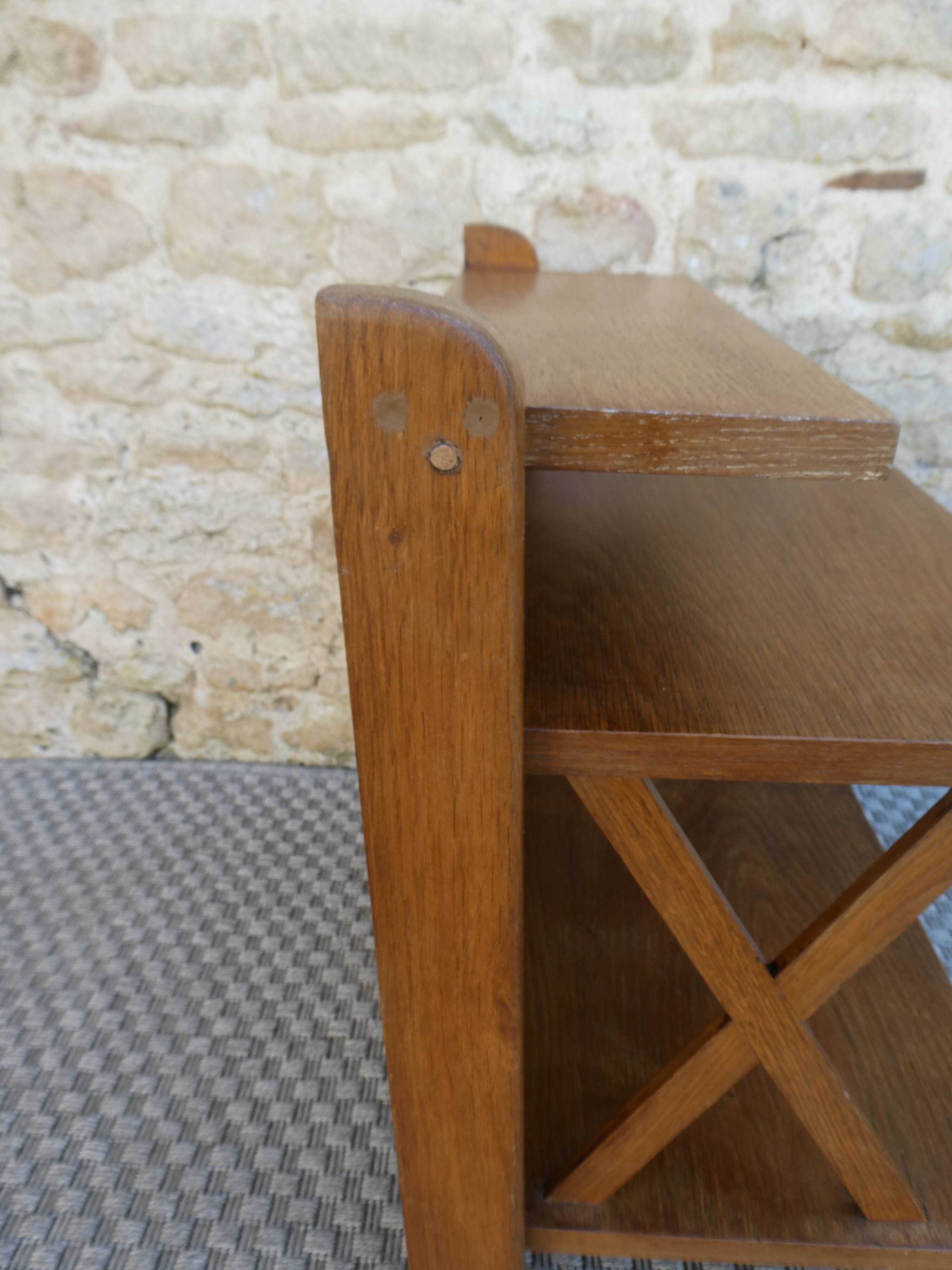 Light wood bedside table with crossbars and 3 shelves, around 1950.