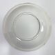 Set of two matching soup plates, one plain and one decorated