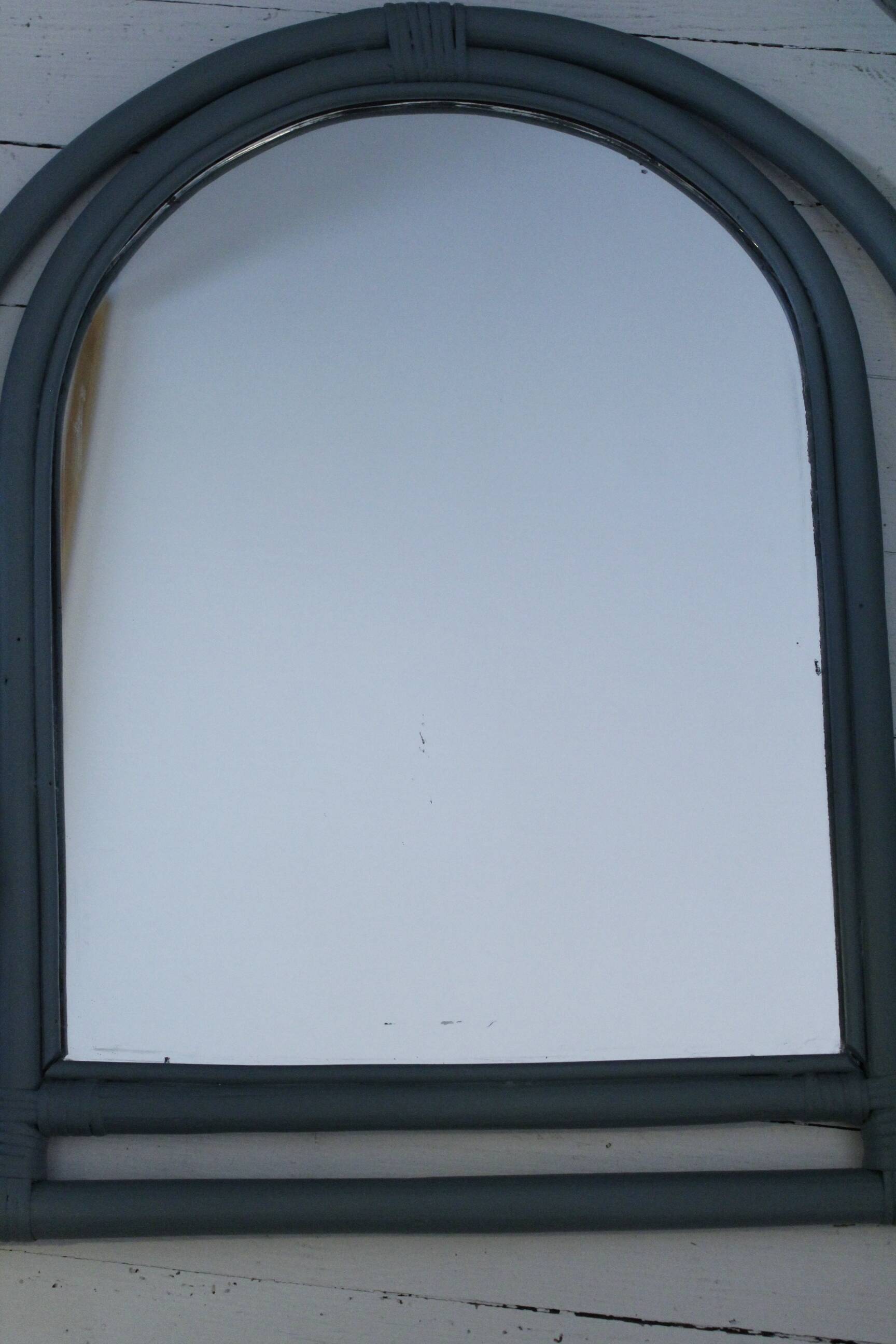Sage green painted rattan mirror