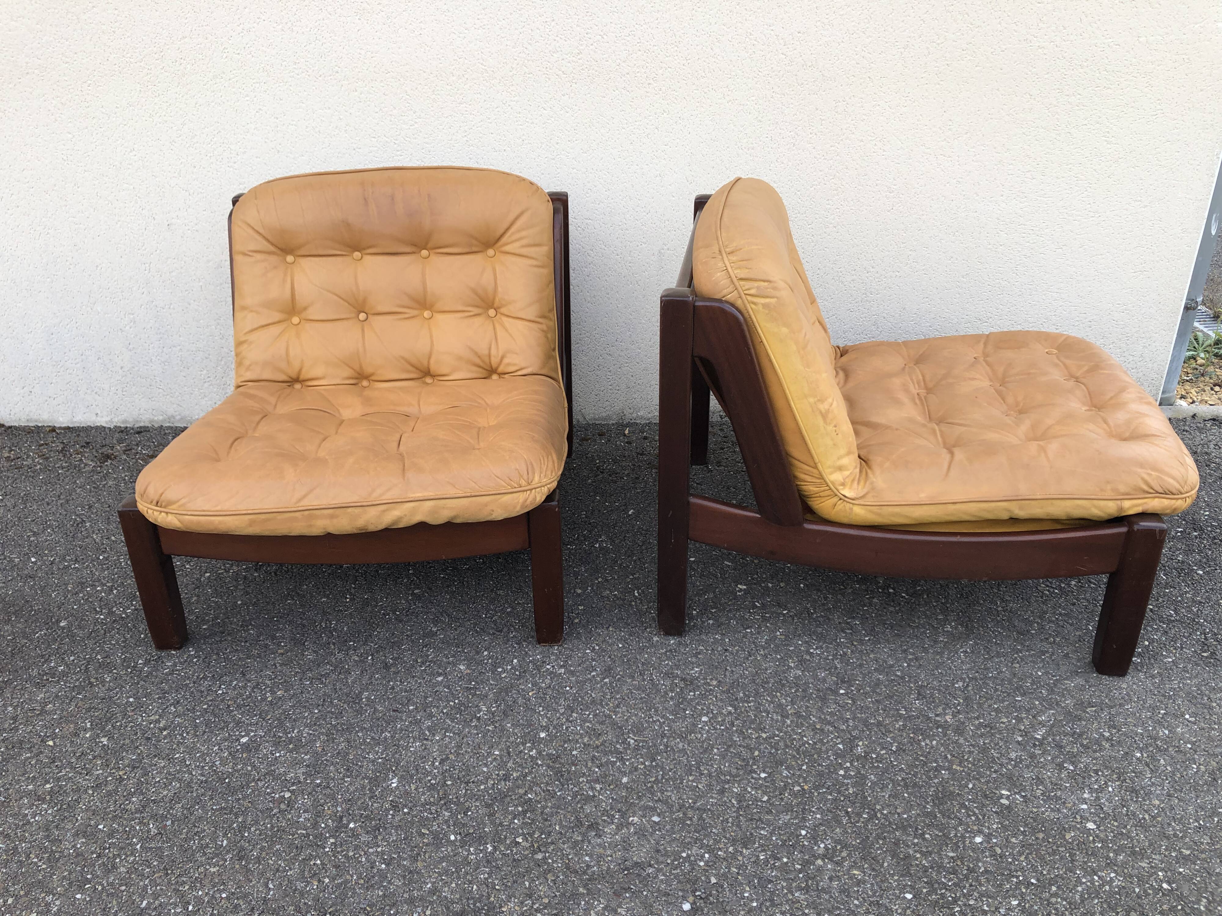 Leather and wood armchairs 70s