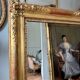 Restoration period mirror in gilded wood from the Napoleonic III era, 165 cm x 130 cm.