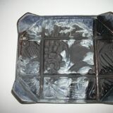 Enameled cast iron trivet. Art Deco