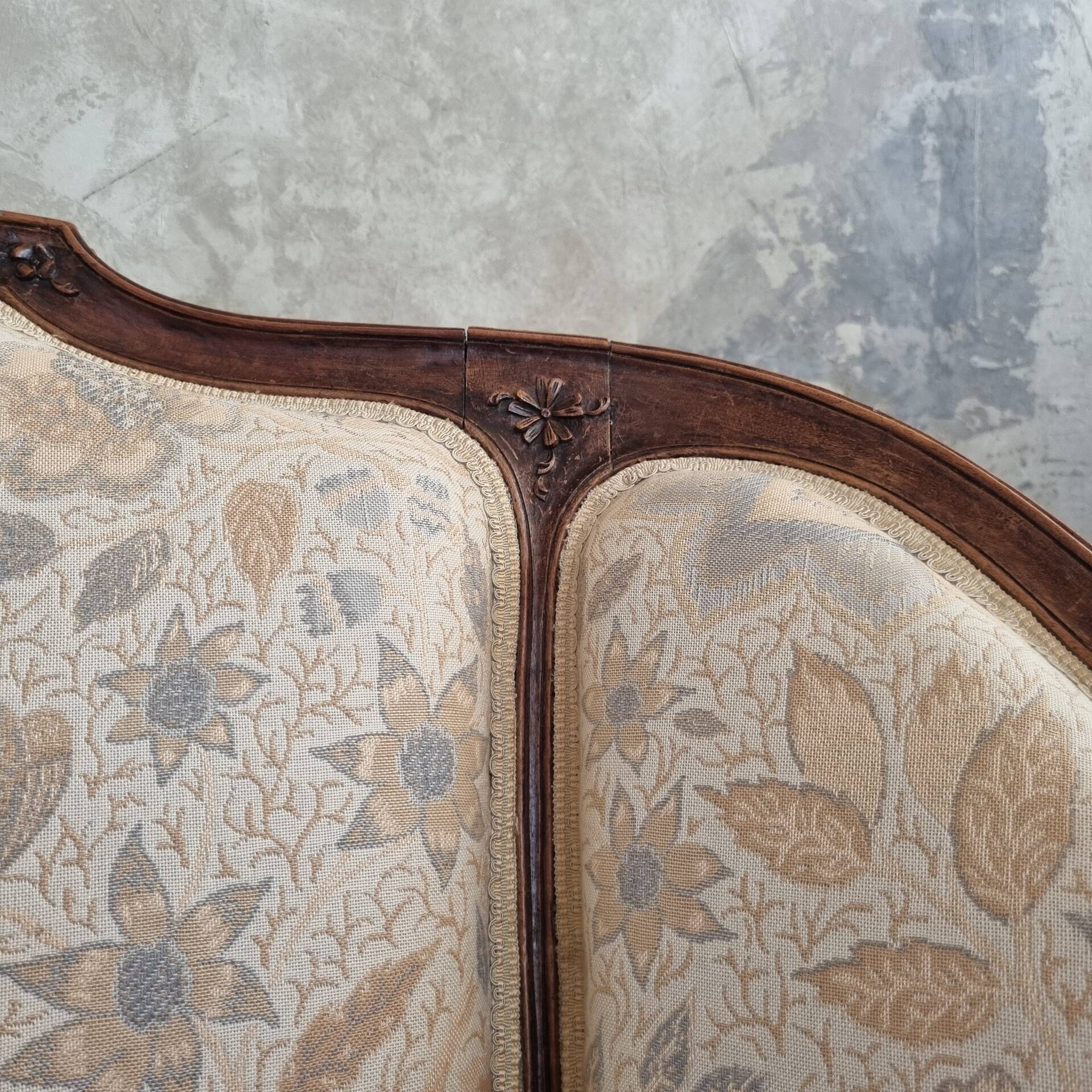Small sofa or bench in Louis XV style, rococo.