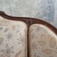 Small sofa or bench in Louis XV style, rococo.